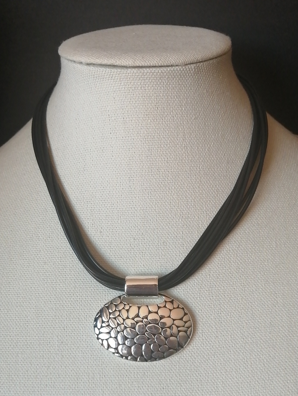 Multi-Strand Black Cord Necklace with Textured Pebbled Silvertone Oval Pendant